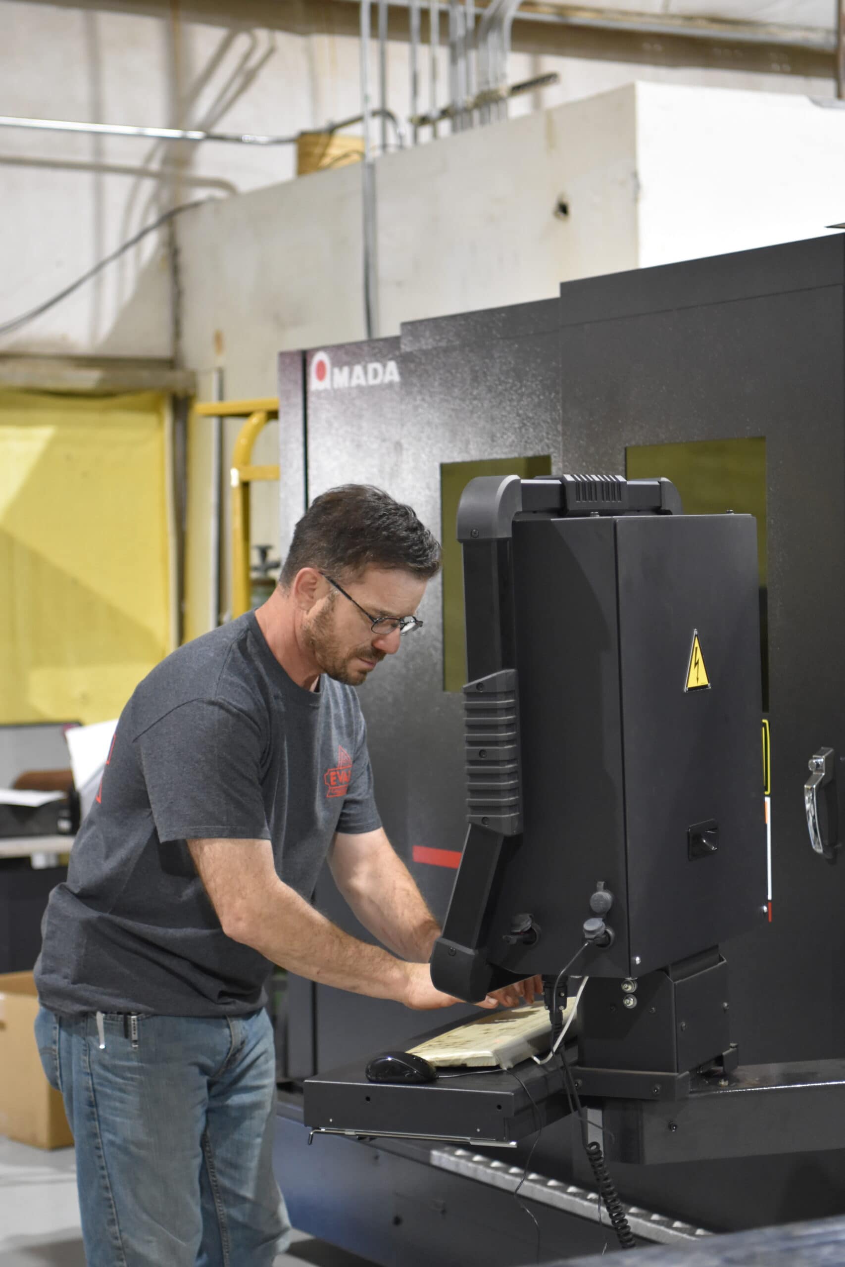 Kev 3 (1) Evans Tool and Die, Inc. and Evans Metal Stamping, Inc