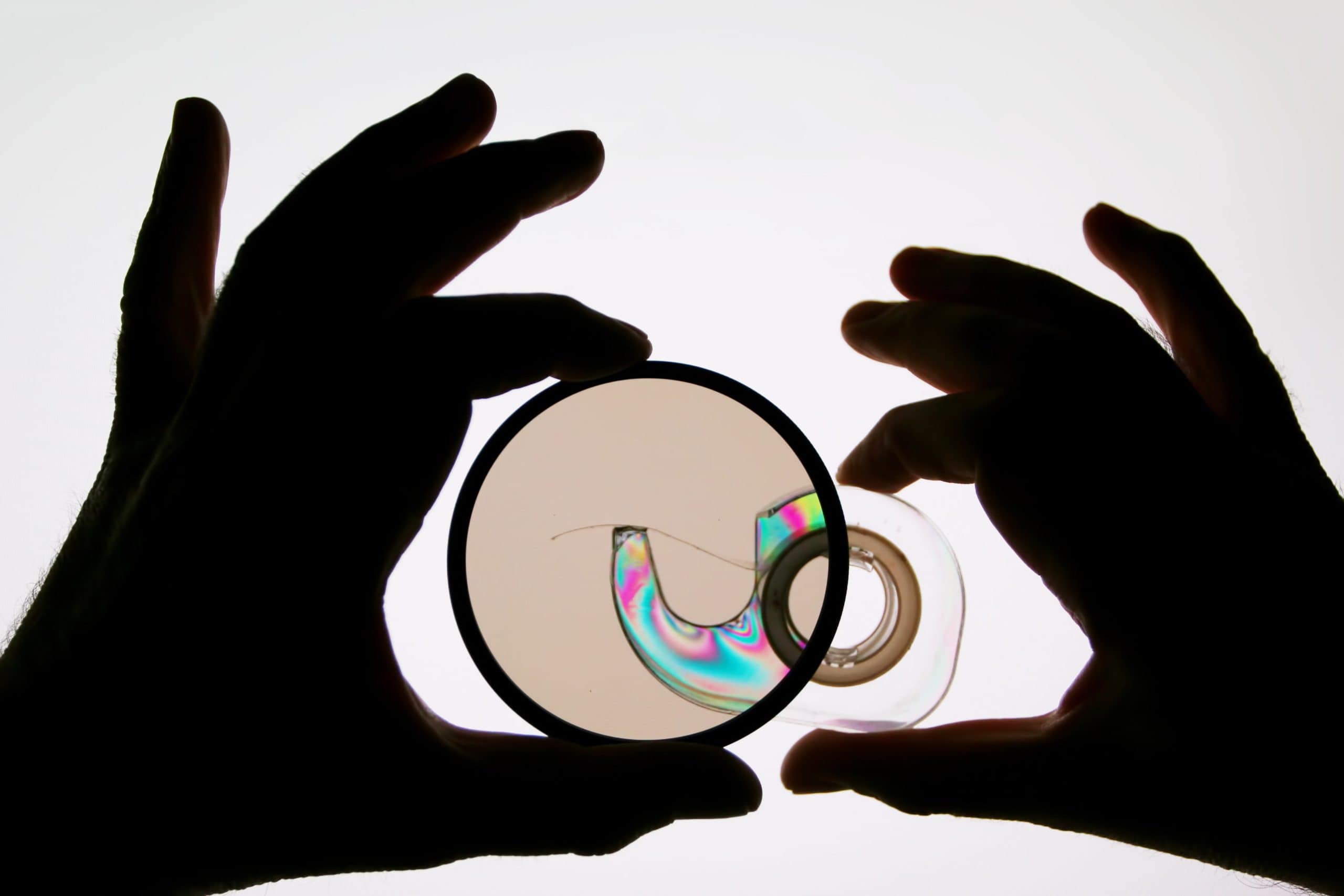 Polarization in Optics Evaporated Coatings, Inc.