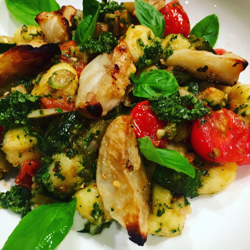 Gnocchi with roast Jerusalem artichokes tomatoes and hazelnut pesto
