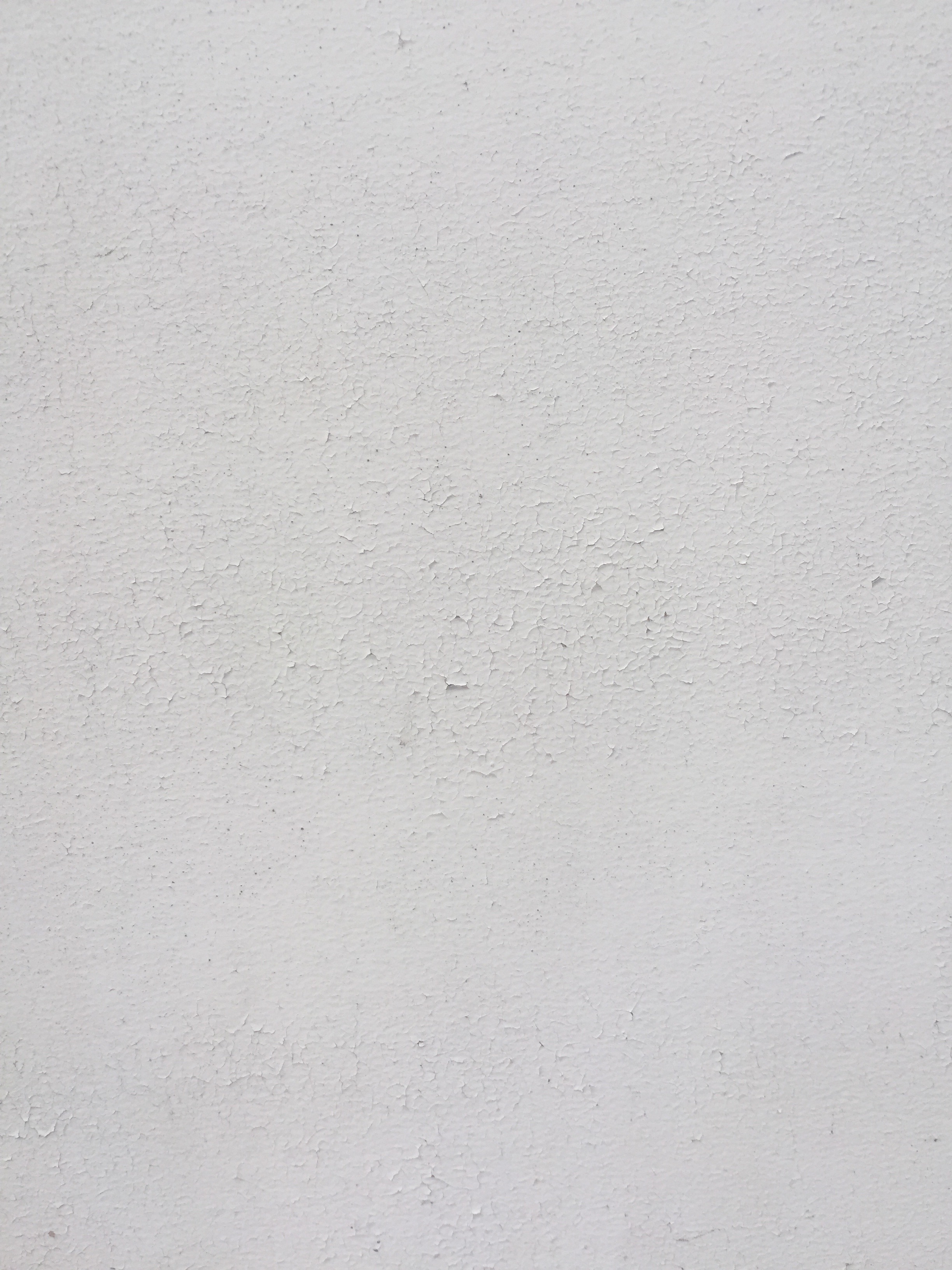 Paint chips on white concrete wall Free Textures