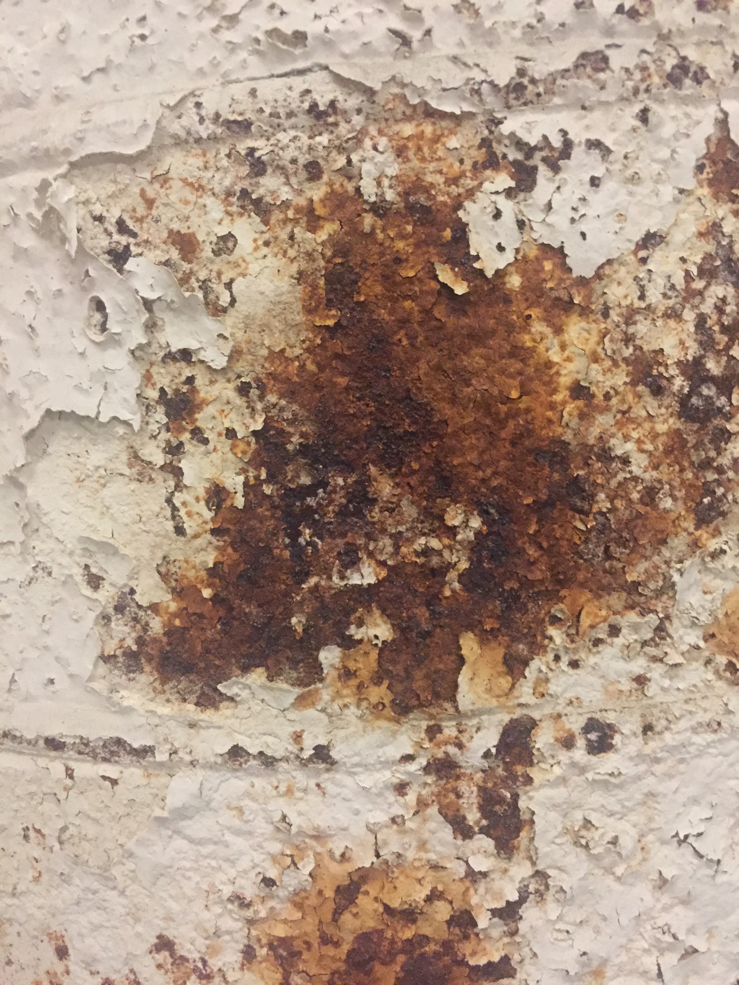 Decaying metal rusting through chipping paint Free Textures