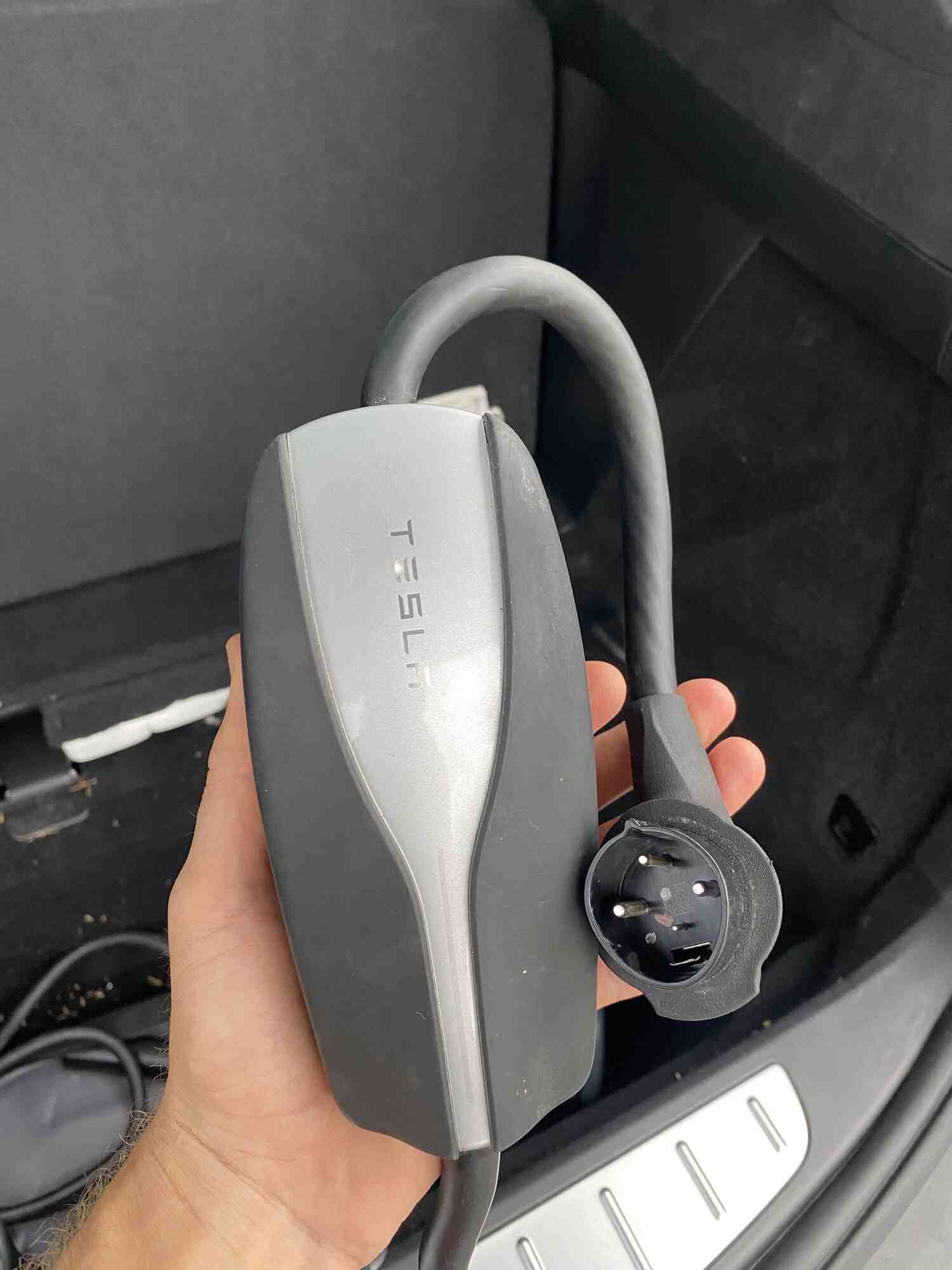 Can you plug a Tesla into a regular outlet? EV News Network