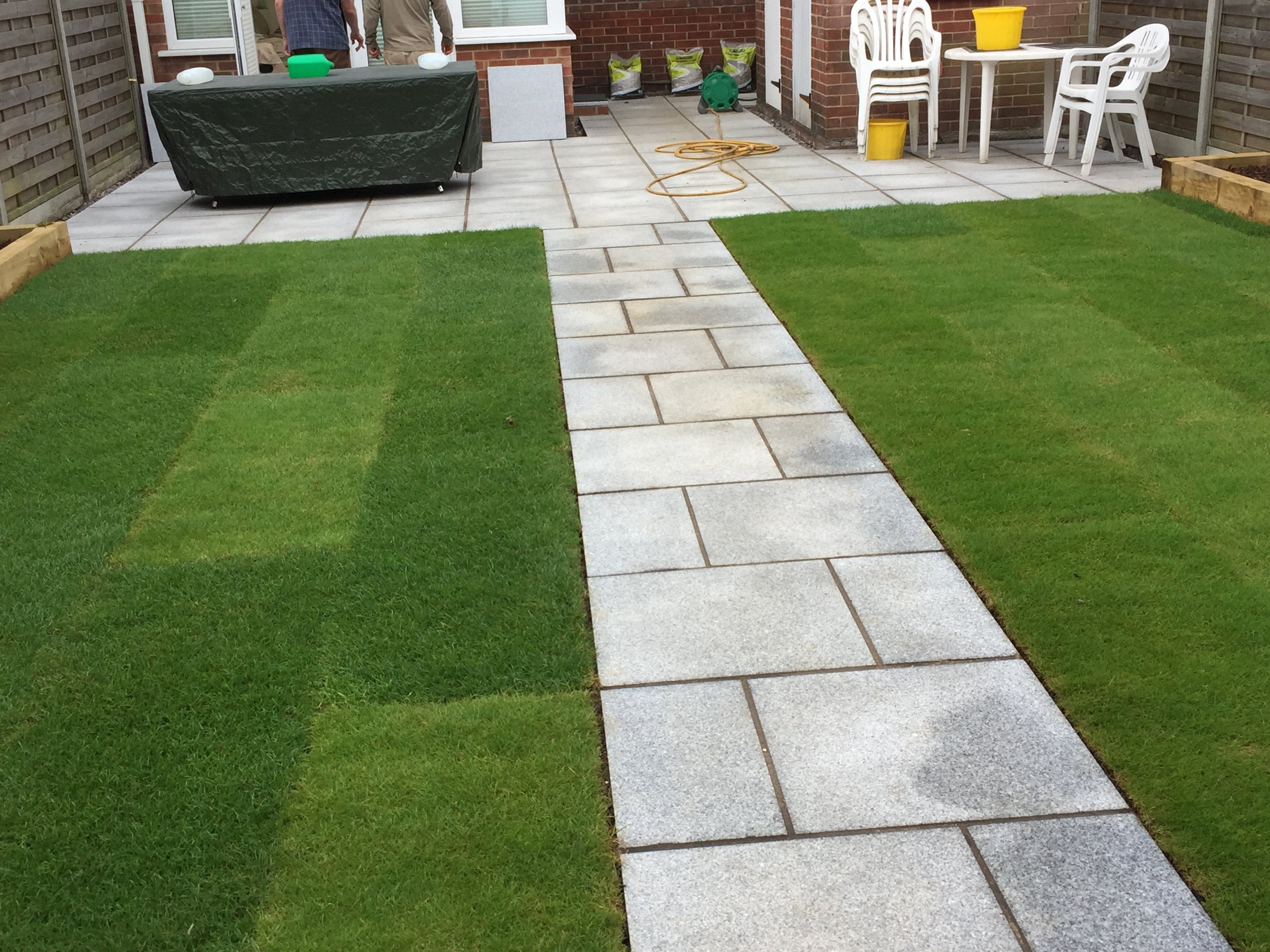 patio and grass complete Evolve Gardens