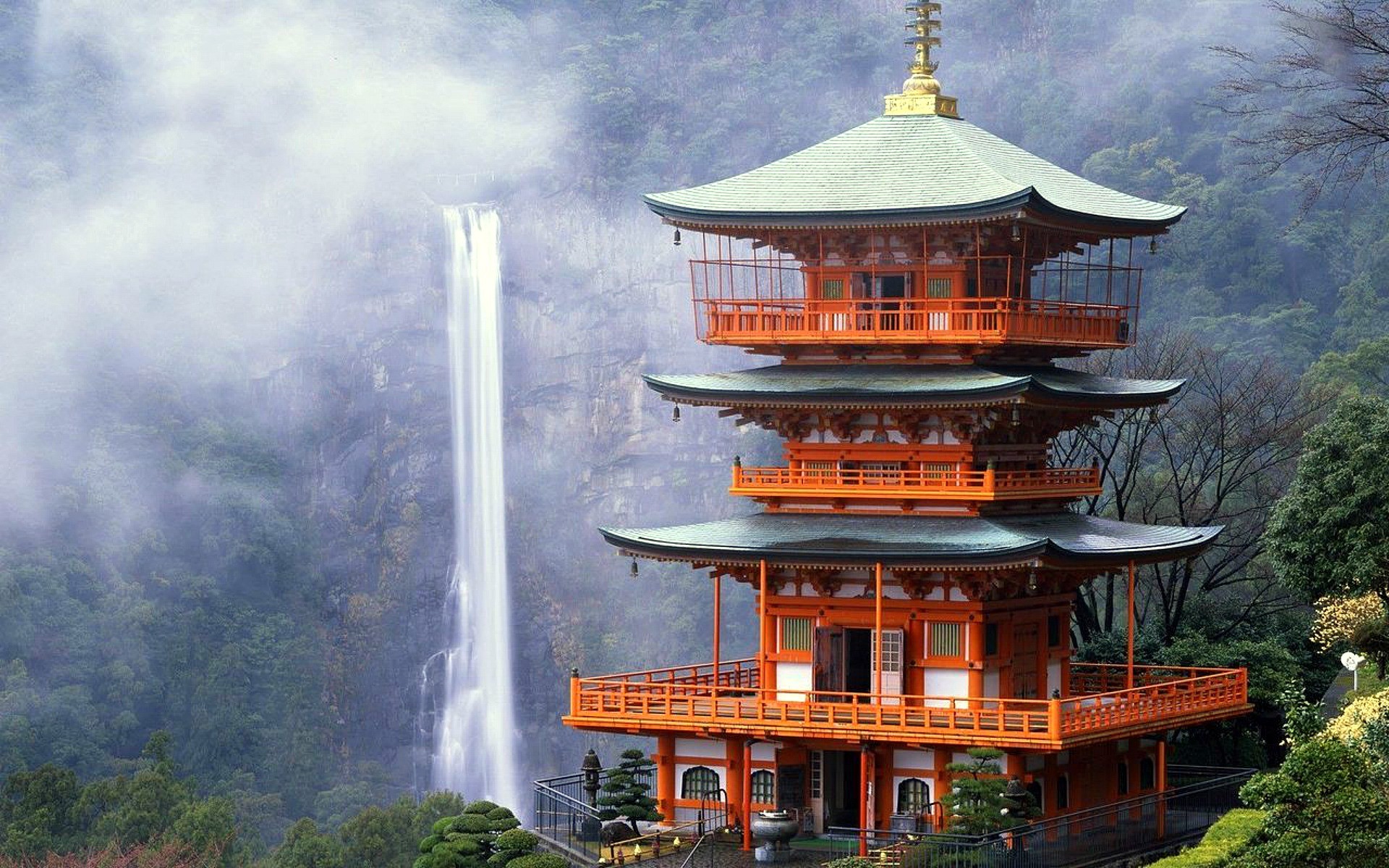 Temple and waterfall in Japan Exploring Tourism