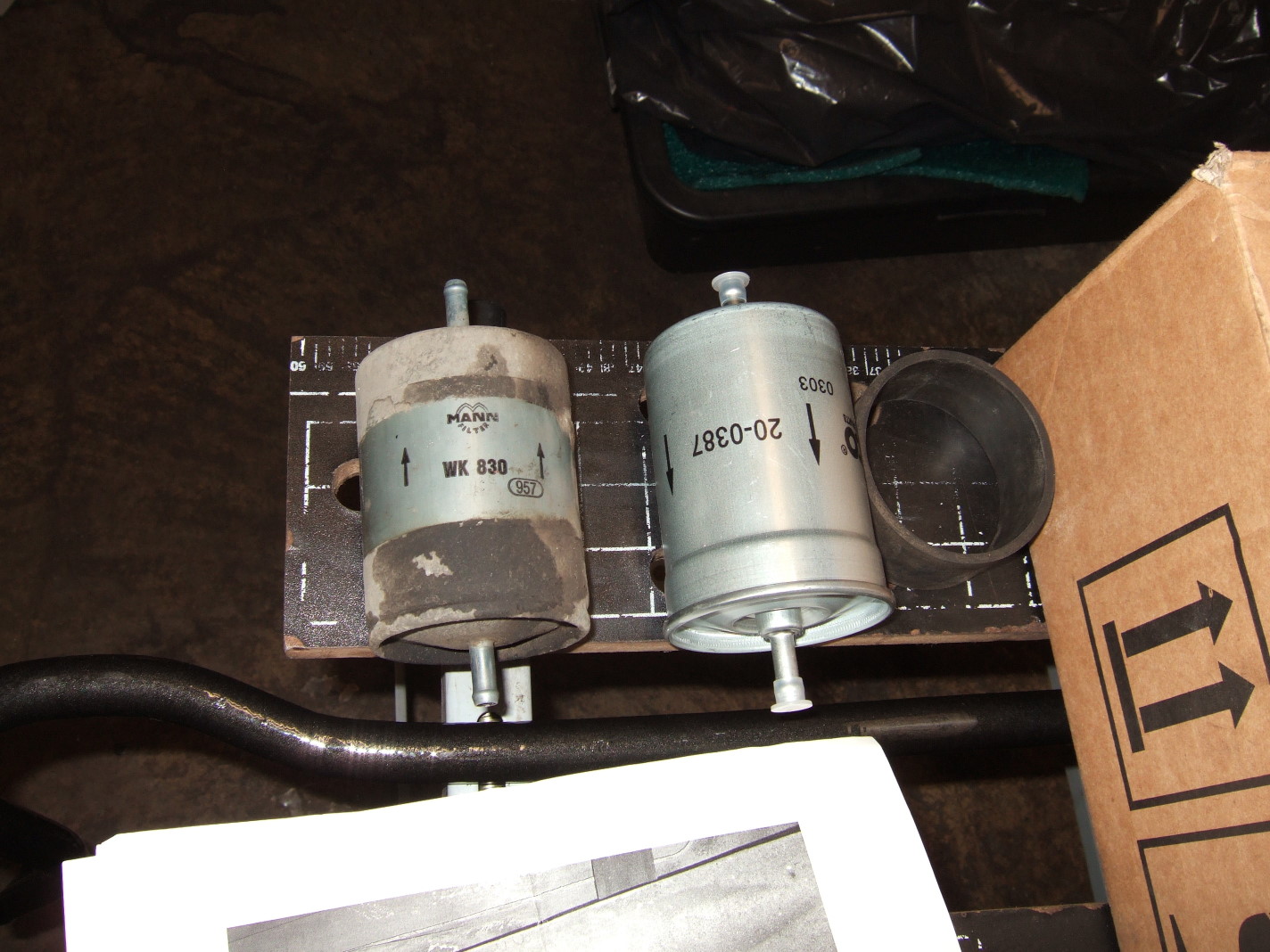 Picture 7 Old and new fuel filter (note the different flow direction