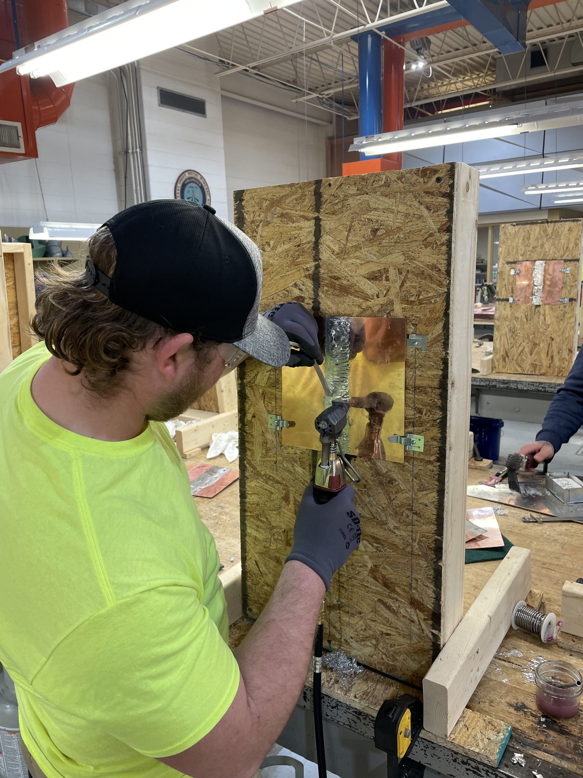 Detroit sheet metal workers gather to learn, certify soldering skills ion