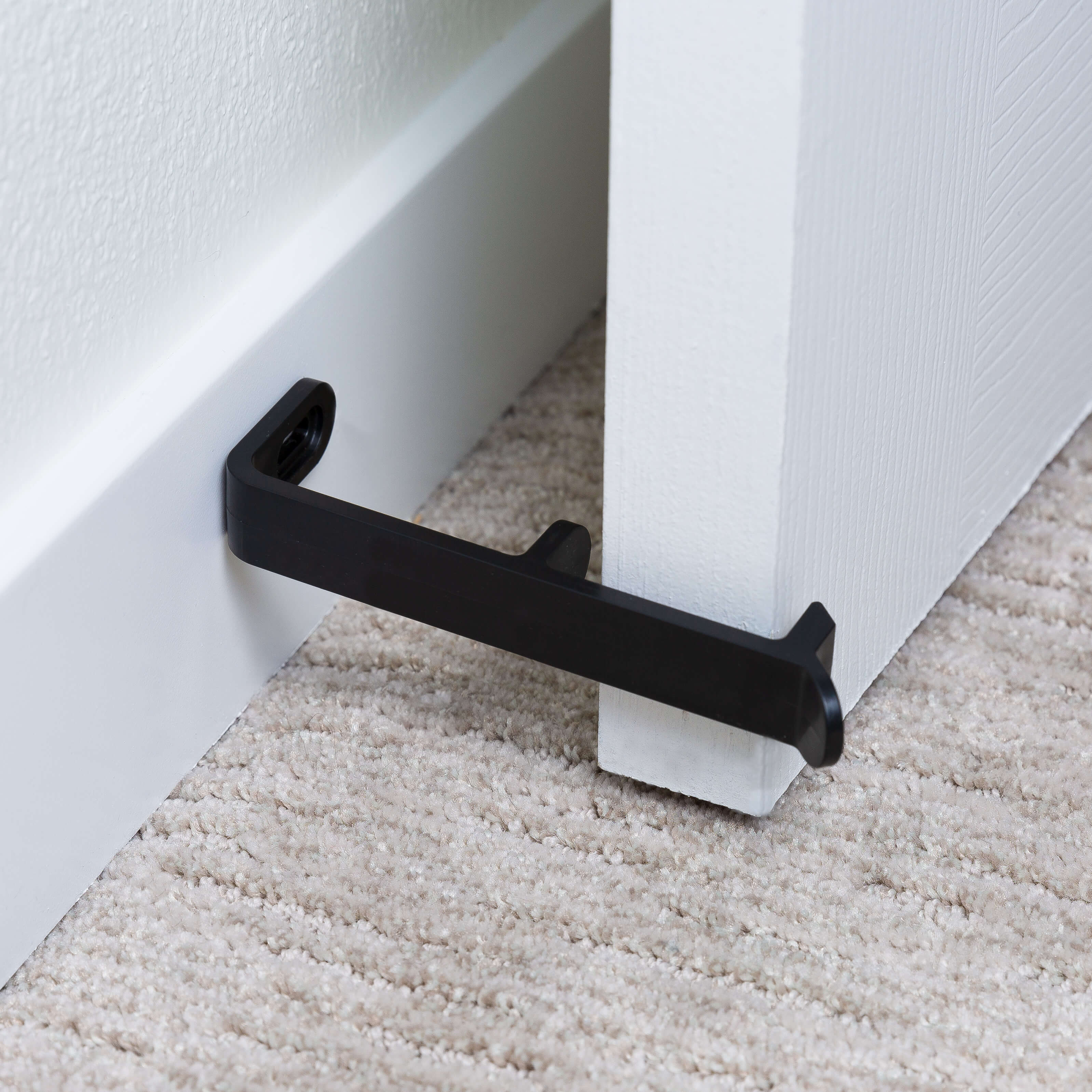 Stop or Prop the twoinone doorstop EZHang Door