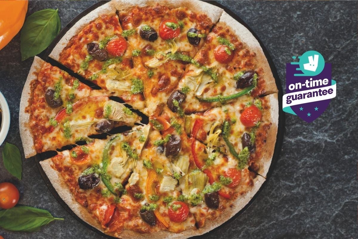 NKD Pizza delivery from Business Bay Order with Deliveroo