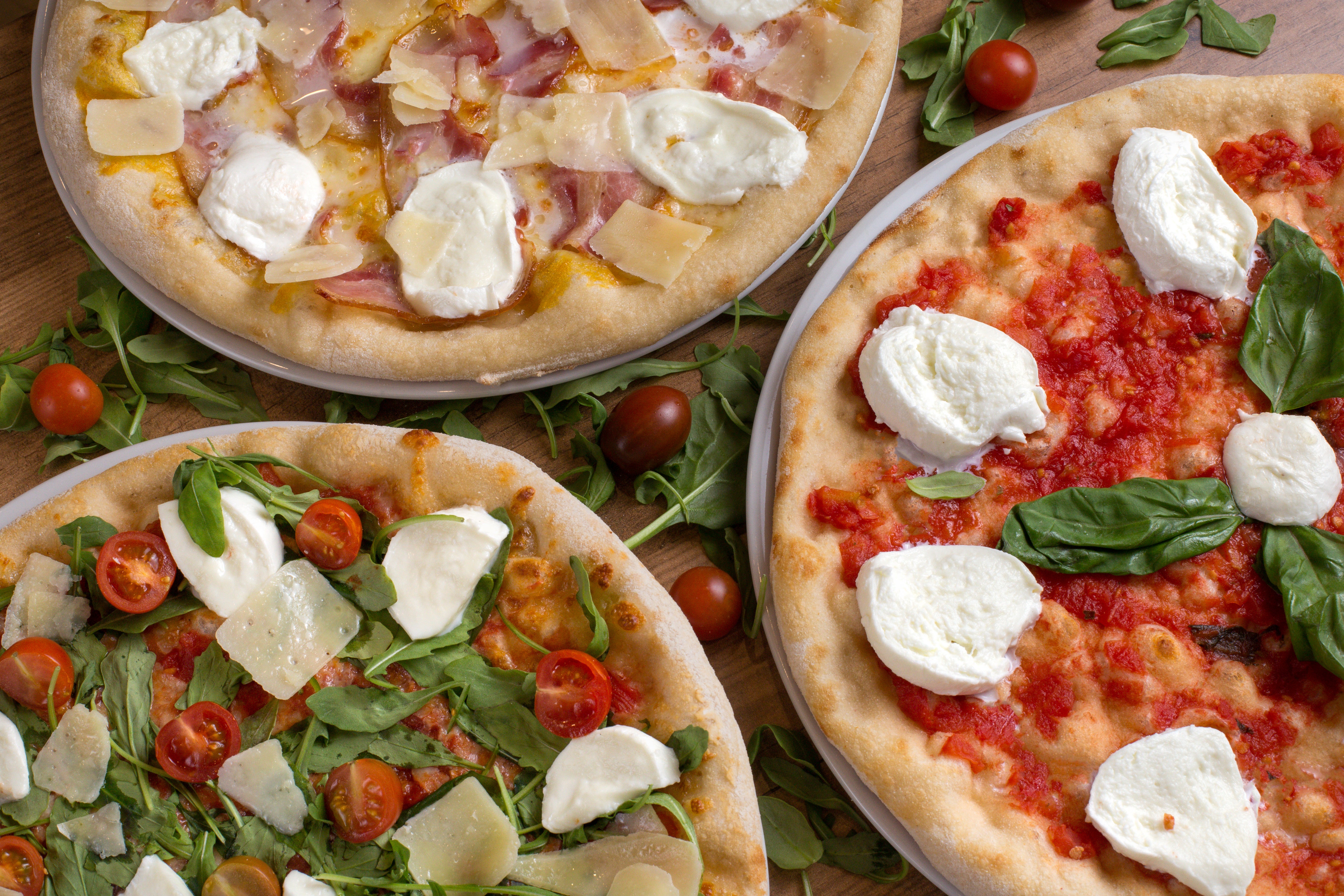 Queen Pizza Olympiadelaan delivery from Kiel Order with Deliveroo