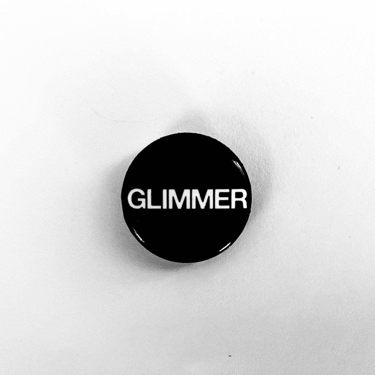 'Glimmer Logo' Button Glimmer