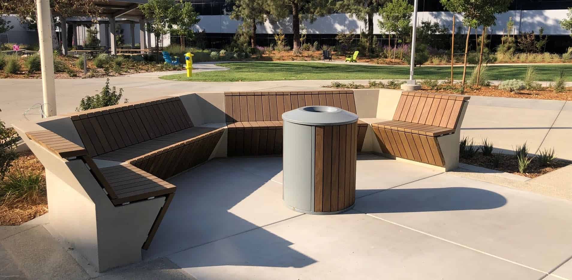 Commercial outdoor furniture line includes benches, tables, and receptacle