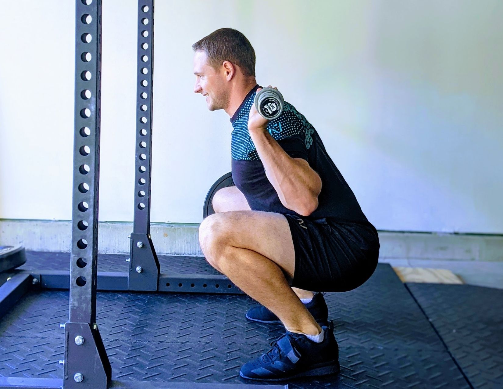 3 Reasons You Have Lower Back Pain After Squats (And How to Fix It