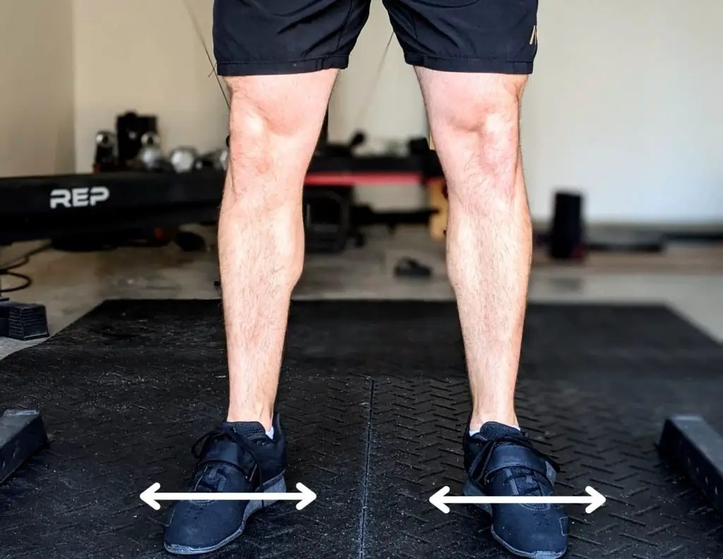 3 Reasons You Have Lower Back Pain After Squats (And How to Fix It