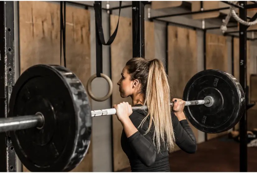 3 Reasons You Have Lower Back Pain After Squats (And How to Fix It