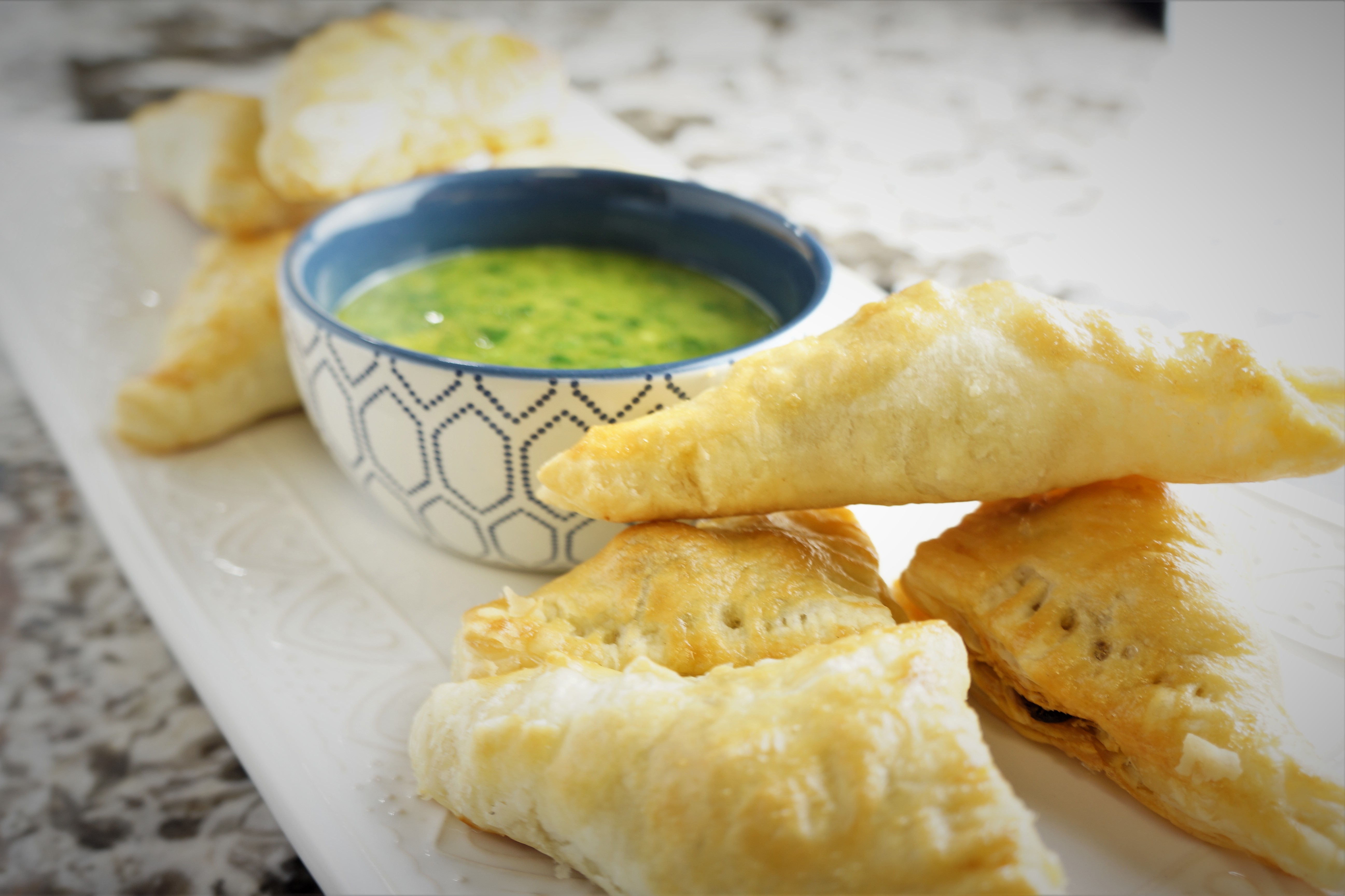 Black Bean and Manchego Cheese Empanadas with Chimichurri Sauce The