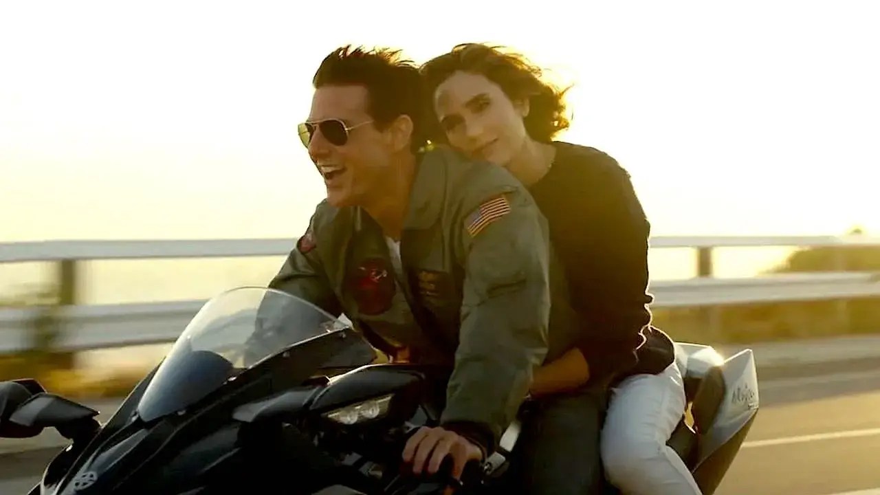Tom Cruise and Jennifer Connelly on a bike from Top Gun Maverick