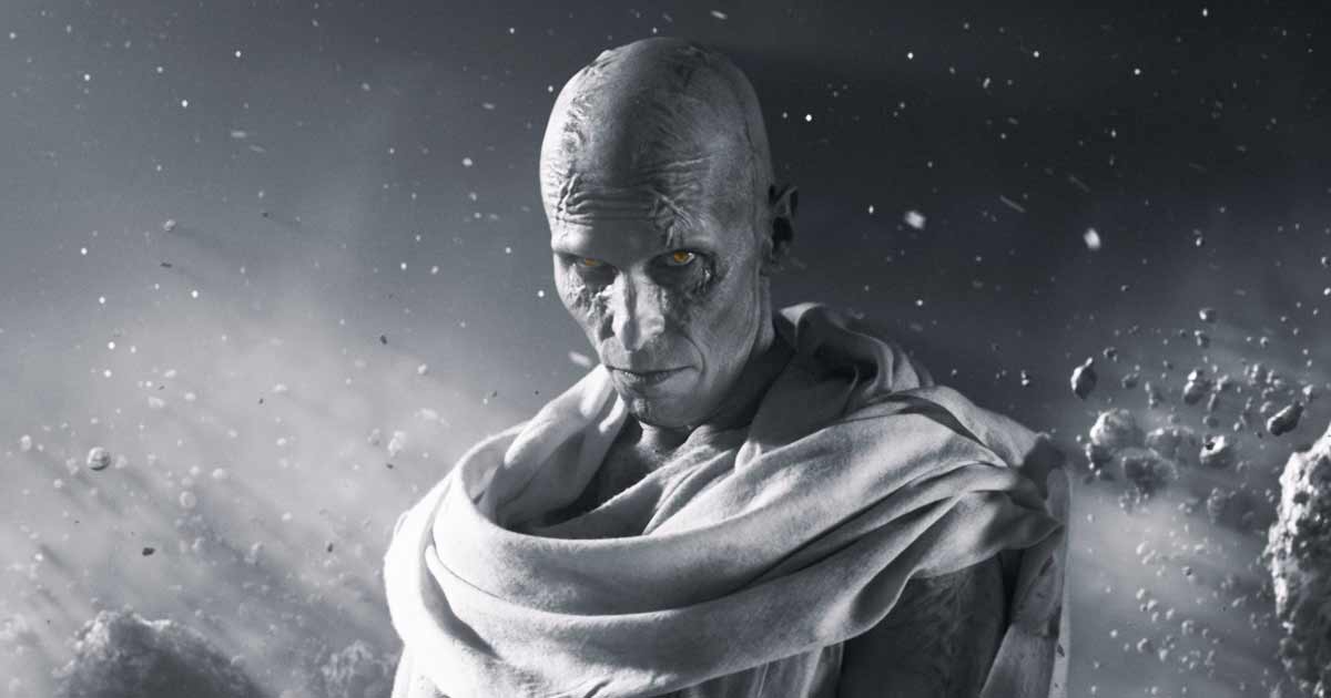 Christian Bale looks in front