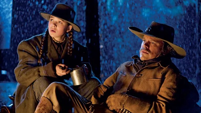 Matt Damon and Hailee Steinfeld in True Grit (2010)