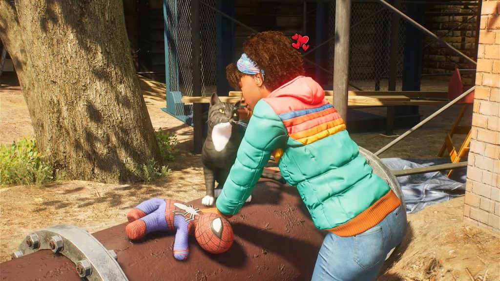 Hailey is petting a cute cat in Marvel’s Spider-Man 2 side mission.