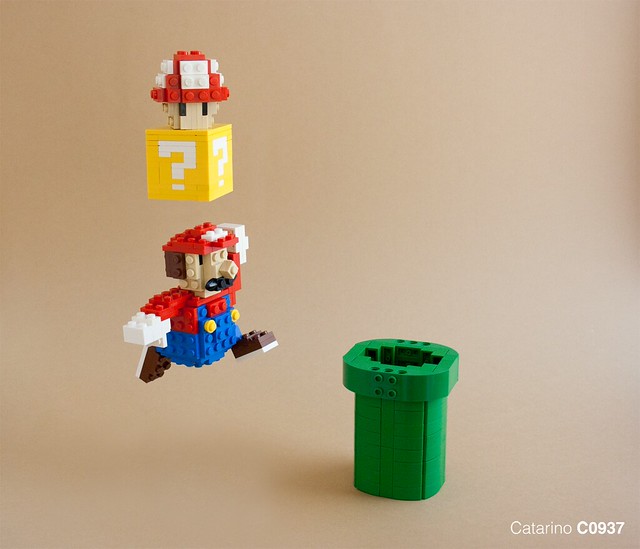 Brickbuilt Mario bounces toward LEGO Bowser The Brothers Brick The Brothers Brick