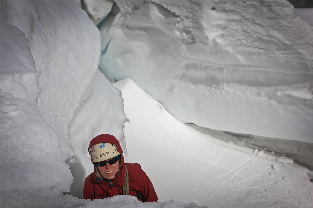 Hang me out to dry! Having fun in a crevasse of  Yanapaccha's glacier. Cordillera Blanca. Peru.