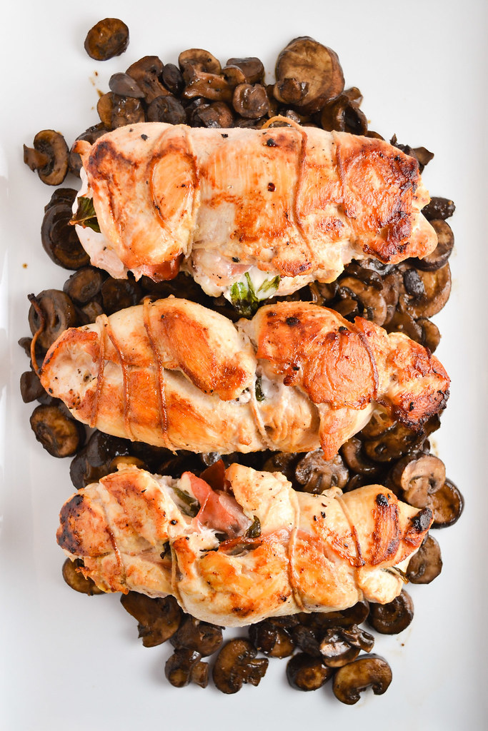 prosciutto, goat cheese, and basil stuffed chicken with mushrooms