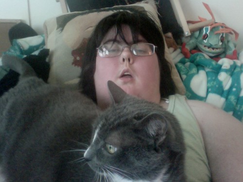 Fey on my lap, with me looking exhausted.