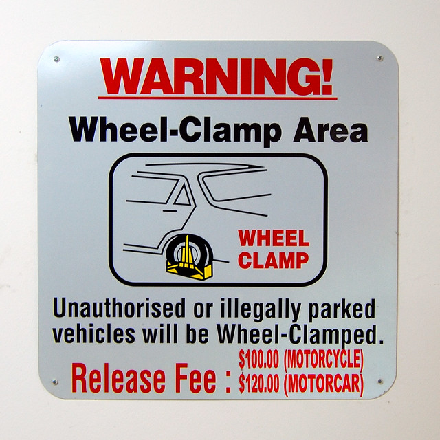 Warning. WheelClampArea Wheelclamp warning in Singapore… Flickr