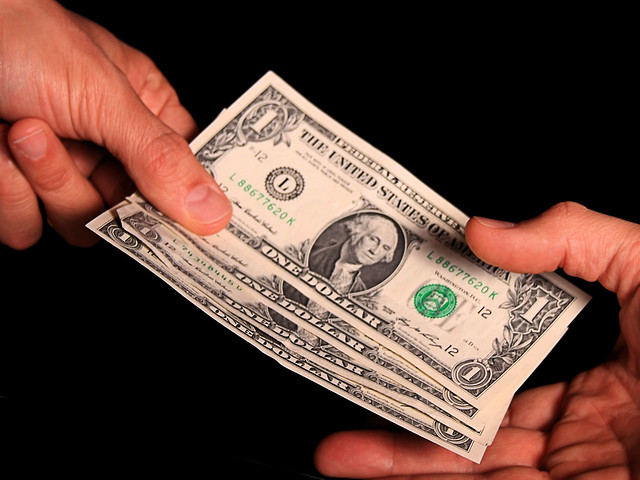 Money changing hands Flickr Photo Sharing!
