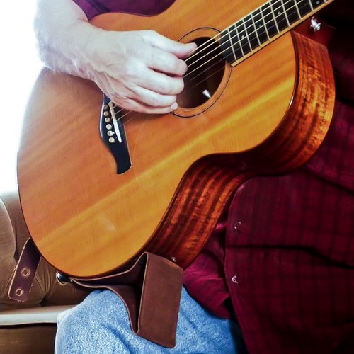 Left knee or right? The Acoustic Guitar Forum