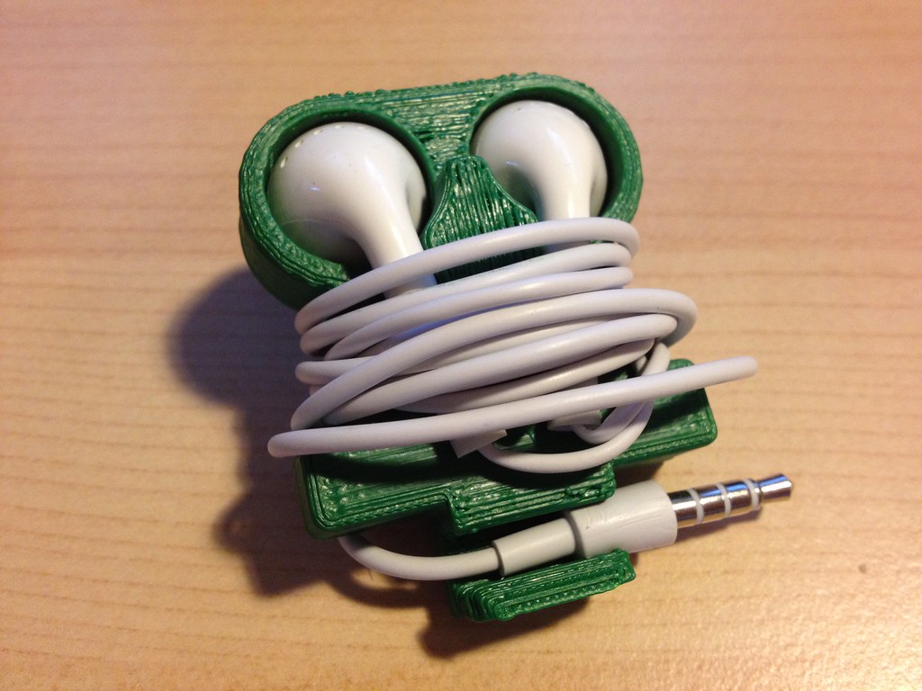 Apple earbud holder John Biehler
