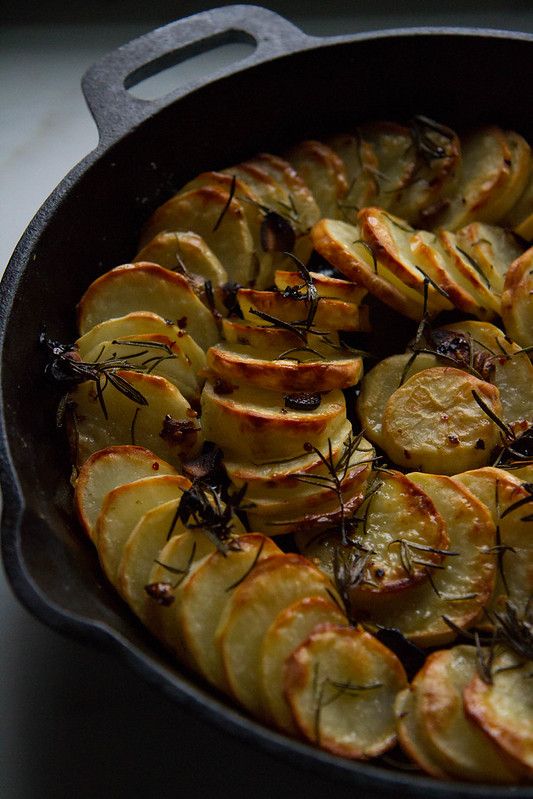 Skillet Baked Potatoes with Chili Garlic and Rosemary Oil Heather Christo
