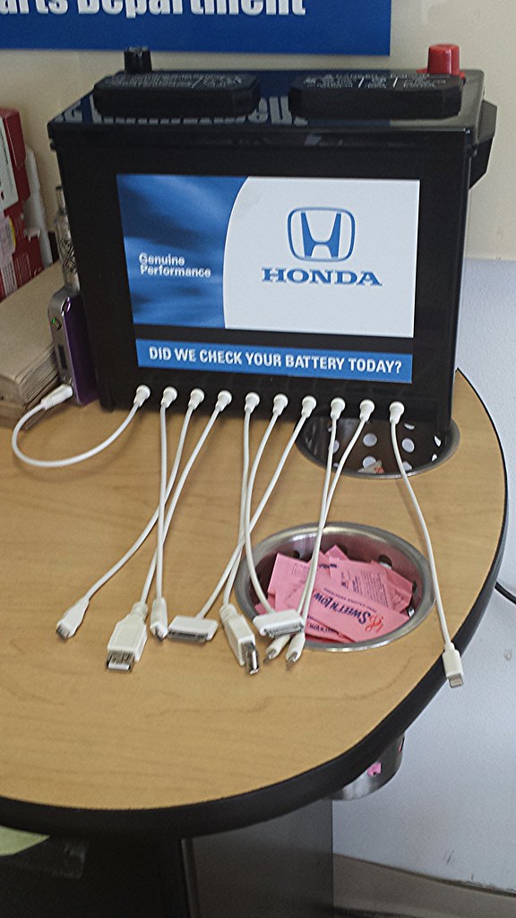 Battery Charger Cell phone charger at the Sport Honda serv… Flickr