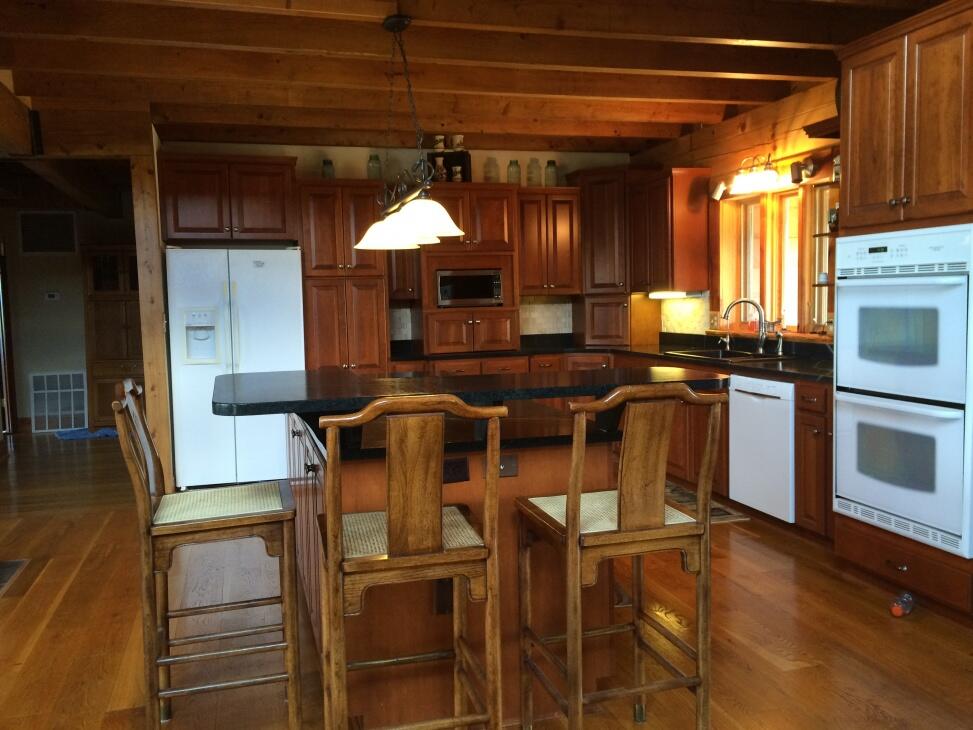 Unique Dream Log Home Overlooking 88 Acres of Picturesque Mountain