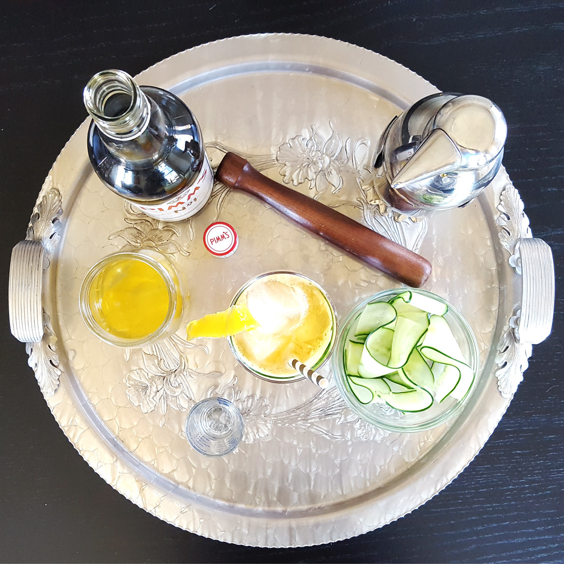 pimm’s cup with lemon simple syrup & muddled cucumber
