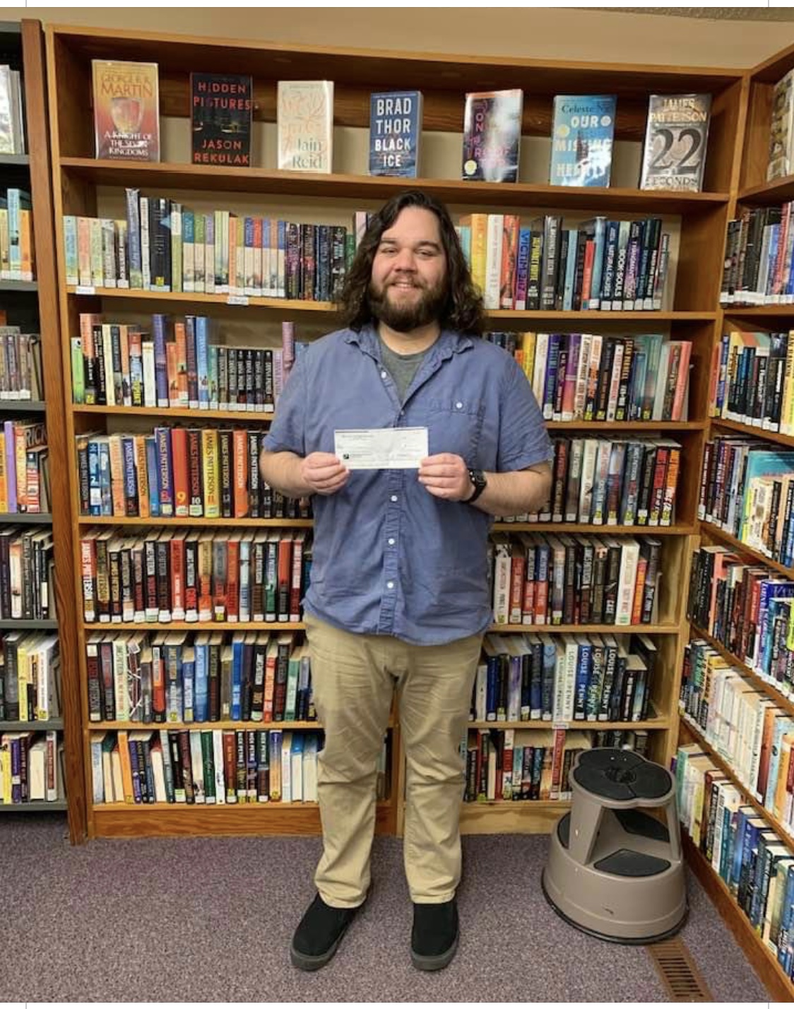 Emo Food Bank/Thrift Shop donate to Emo Library Fort Frances Times