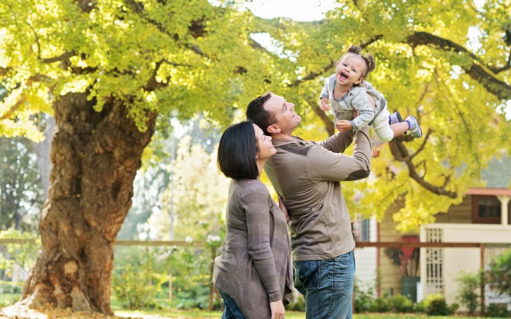 A family smiles and makes memories together.