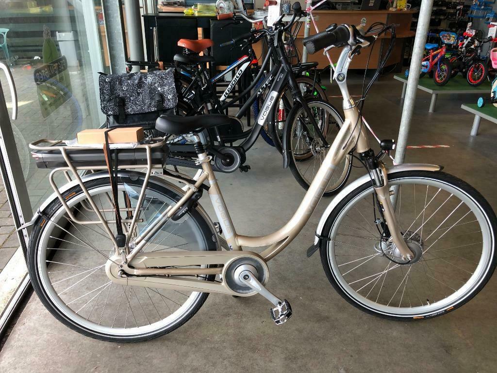 Vogue Premium E Bike Nexus 7 Champagne 48 Cm 2022 - Fietsmaster