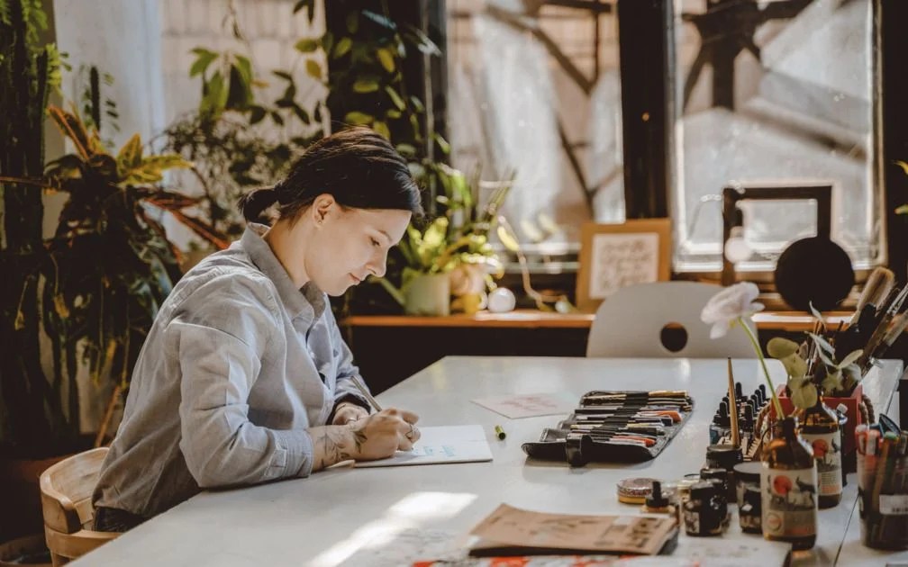 How Do Artists Make Money on Spotify Printful Printful