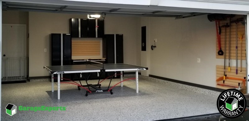 Residential Garage Epoxy Flooring and Storage Solution in