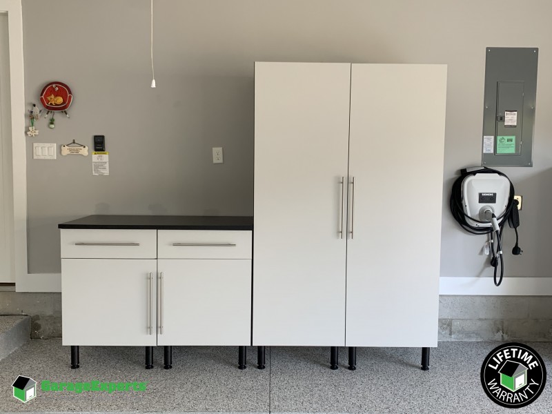 Residential Garage Epoxy Flooring and Storage Solution in St