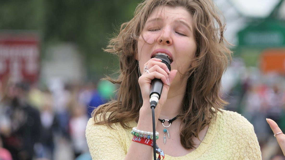 To help a singer hit a convincing high note, a vocal coach might steer