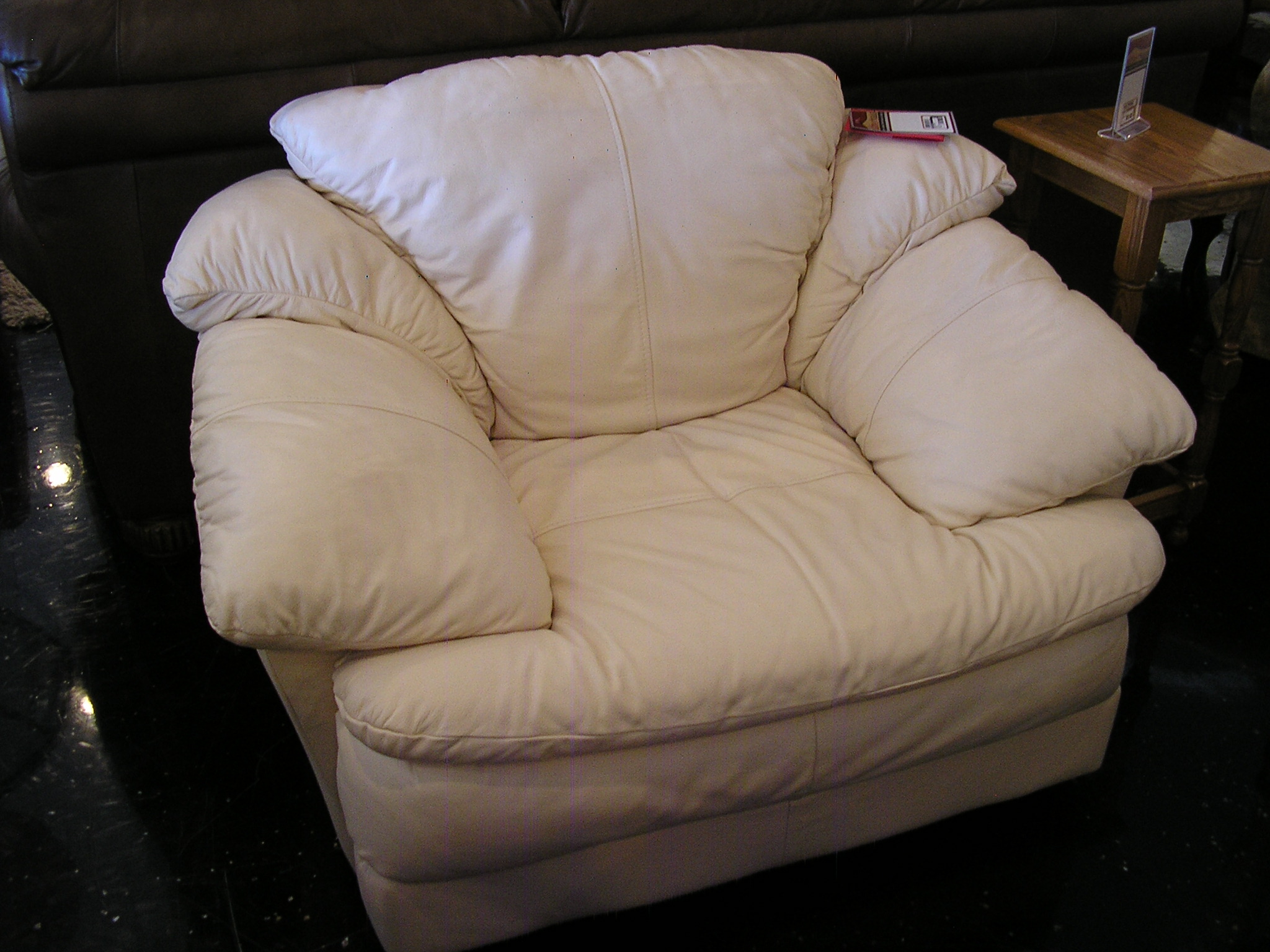 A white leather chair from Ubberhaus for 350, find this and many more