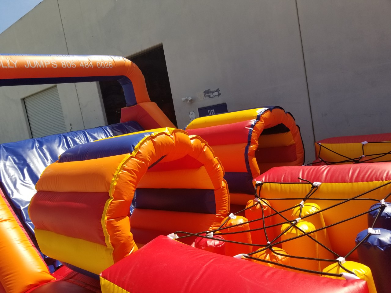 AtoZ Obstacle Course Jolly Jumps water slide and bounce house