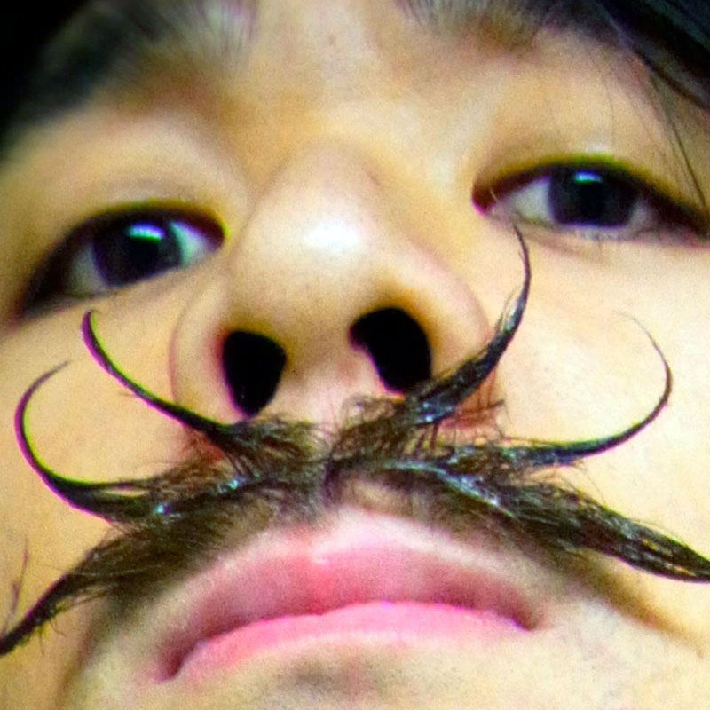 A Man With A Mustache In A Country Without Facial Hair