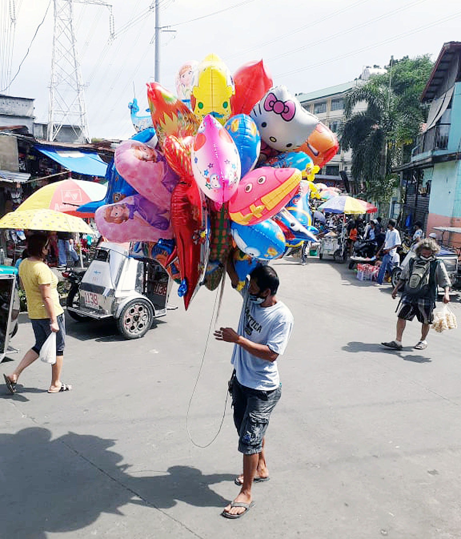 Balloon vendor Photos Philippine News Agency