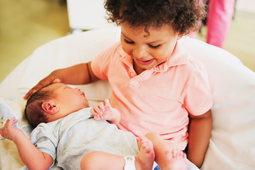 7 Ways To Prevent Jealousy Between Your Toddler and New Baby Filter