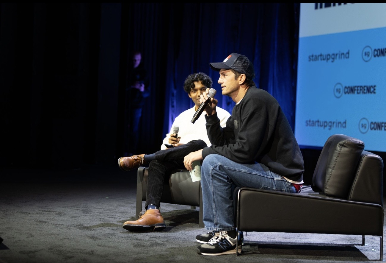 Warp Founder and Ashton Kutcher talking what AI reduces at Startup Grind conference 2026