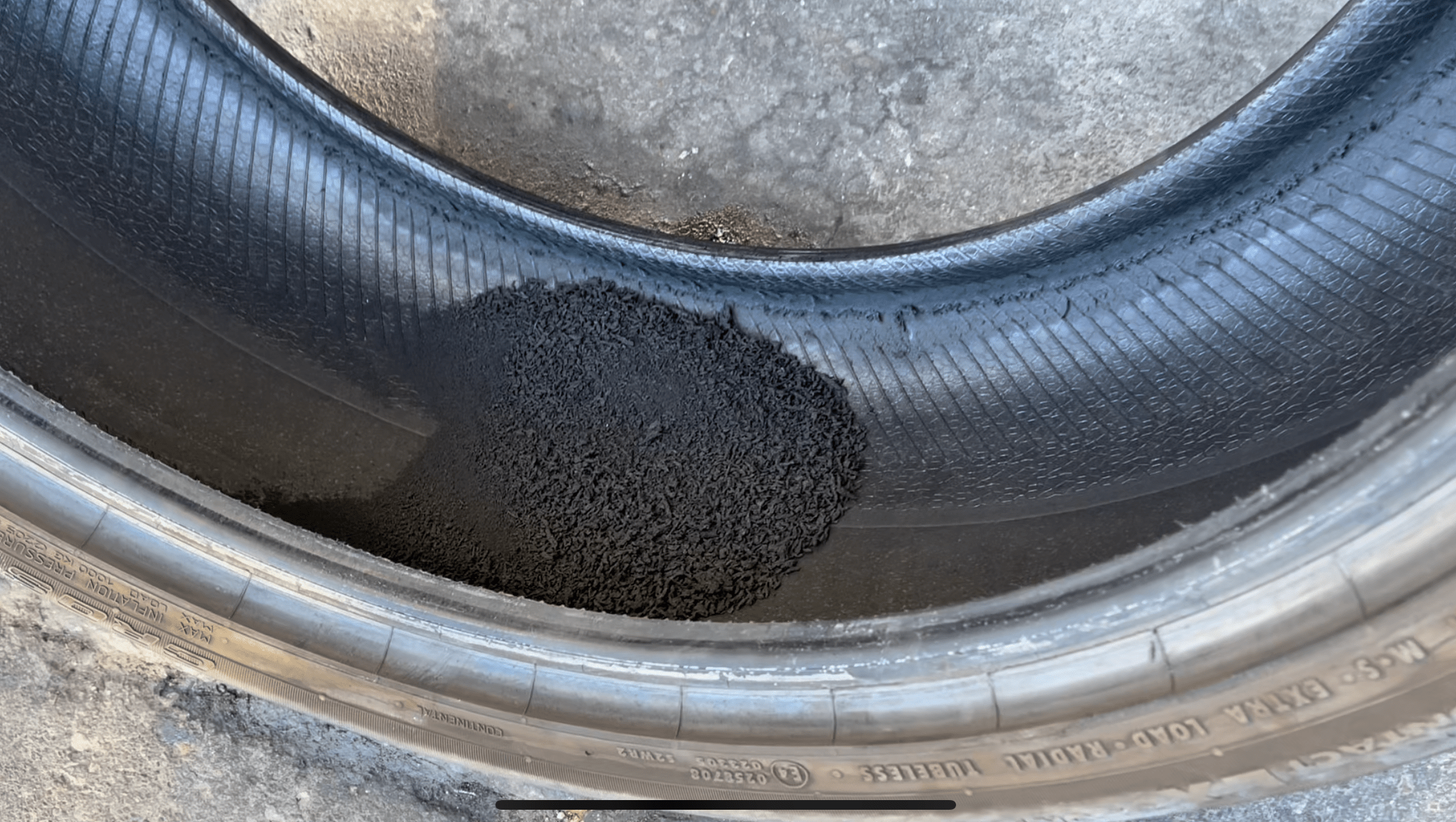 flat tire with rubber inside and shredded side wall