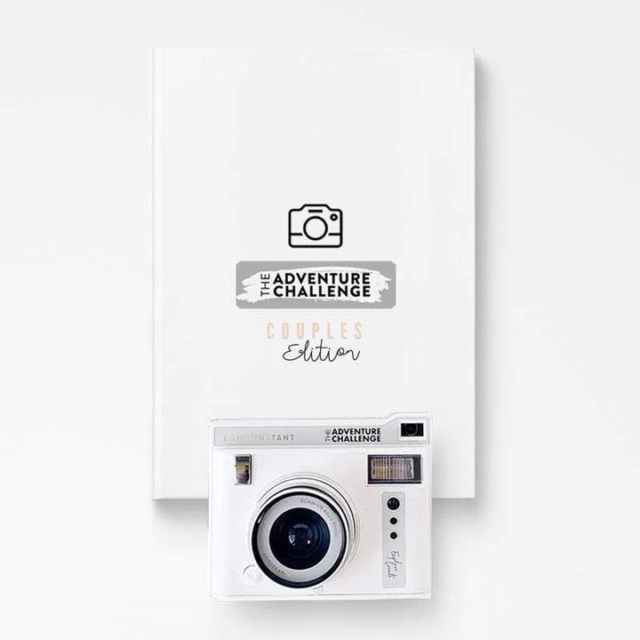 A Couples Adventure Challenge book, complete with a cute white polaroid camera to capture all of your quality time together!